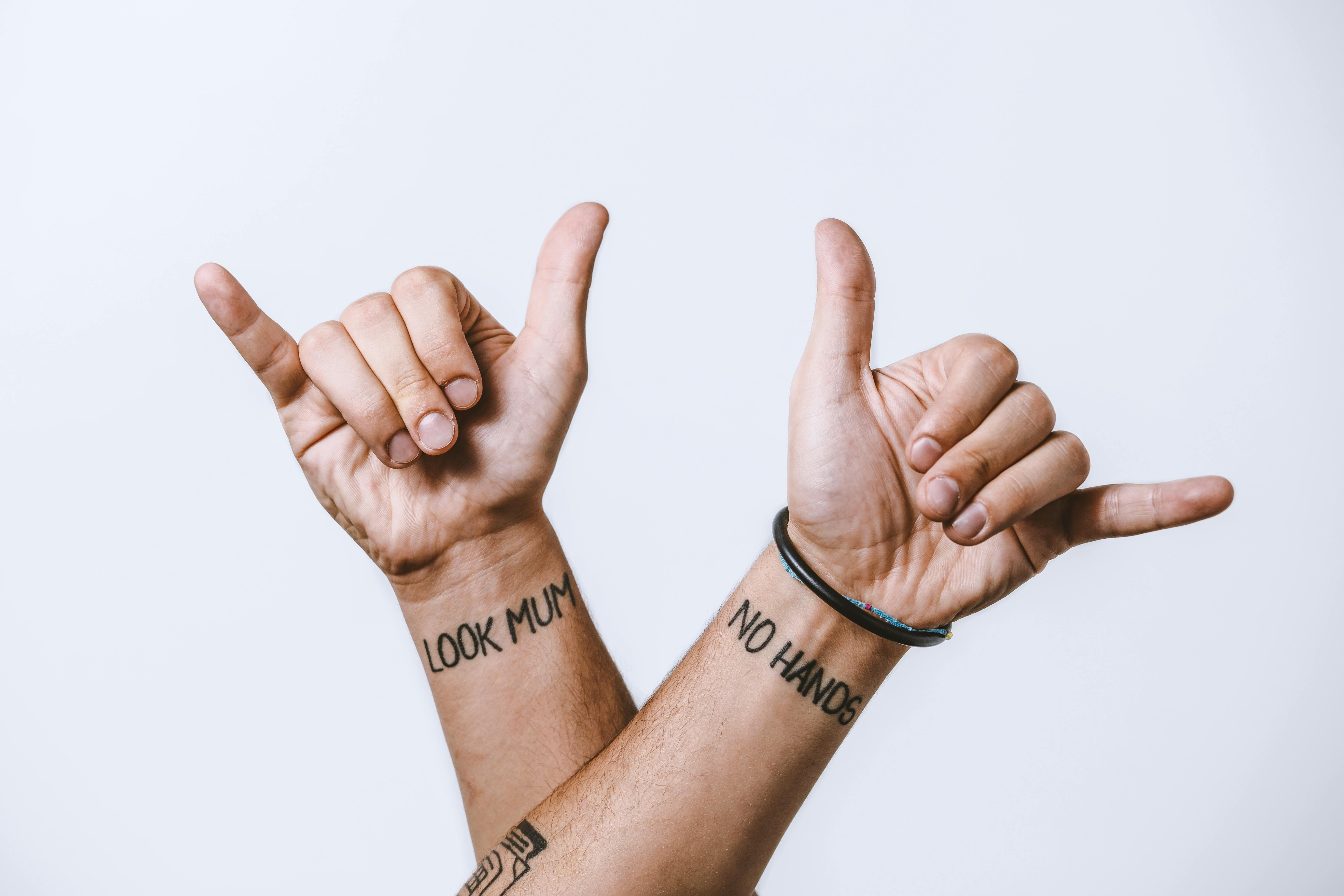 small wrist tattoos for men cross｜TikTok Search